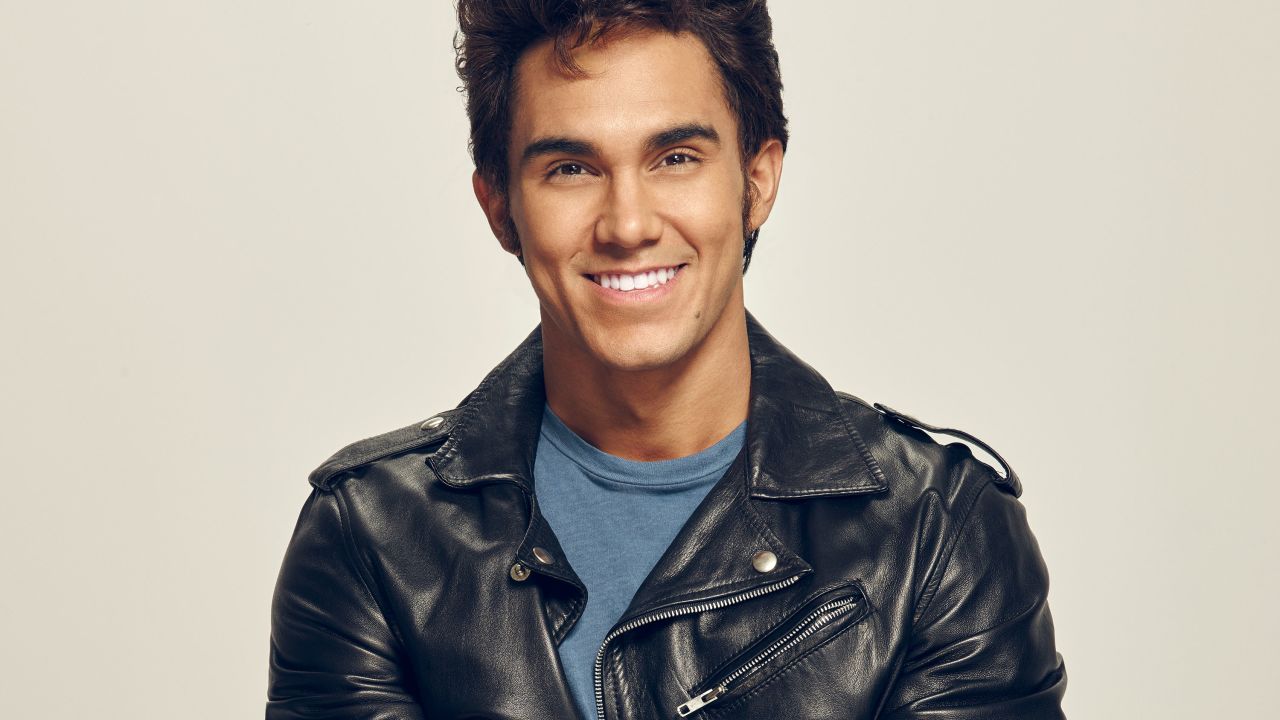 Carlos PenaVega, who plays Kenickie in "Grease: Live," is part of the group Big Time Rush (and was on the TV show of the same name) and hosted Nickelodeon's game show "Webheads."