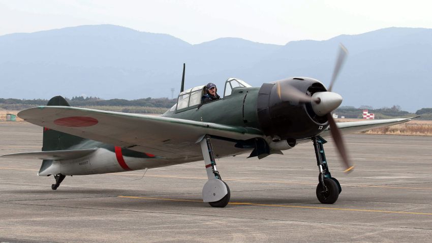 A restored World War II-era Mitsubishi A6M Zero fighter taxis on the tarmac at Japan's Maritime Defence Force's Kanoya air base in Kanoya, Japan, on Wednesday, January 27.