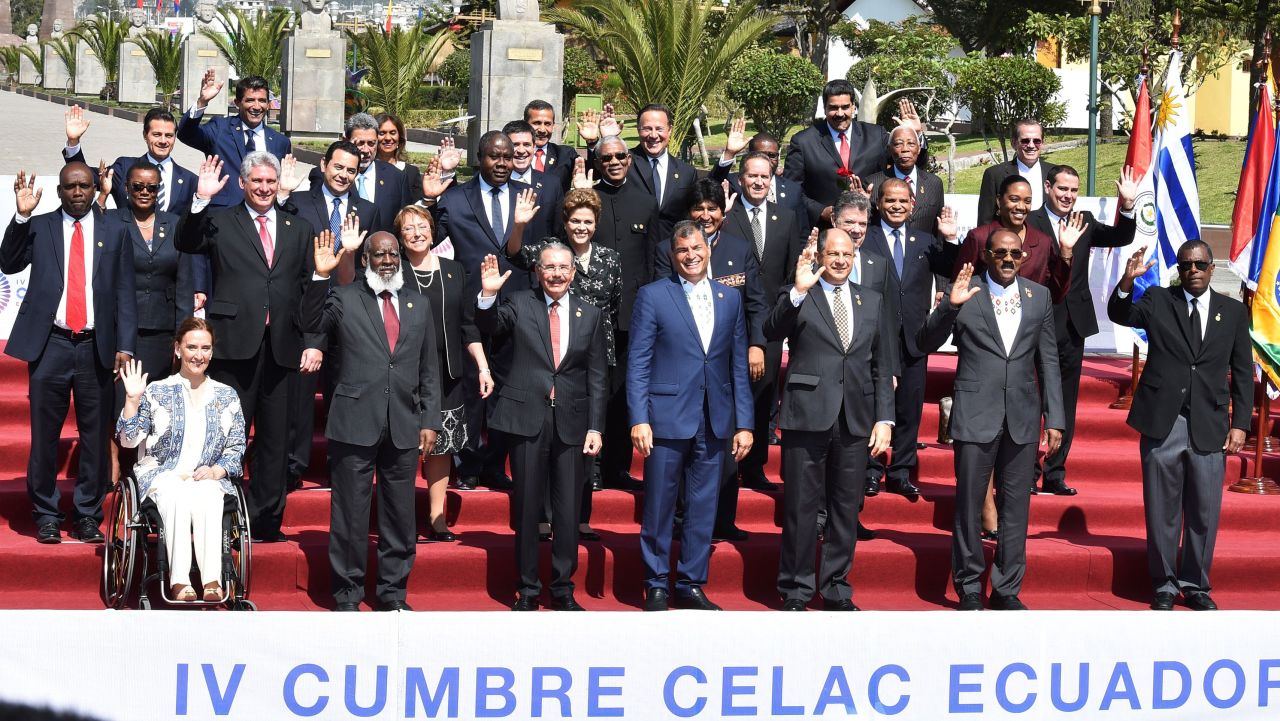 Presidents and other representatives pose for the family picture of the IV Community of Latin American and Caribbean States (CELAC) summit at the Union of South American Nations (UNASUR) headquarters in Quito on January 27, 2016. AFP PHOTO / CRIS BOURONCLE / AFP / CRIS BOURONCLE        (Photo credit should read CRIS BOURONCLE/AFP/Getty Images)