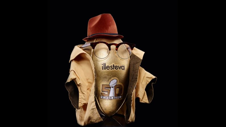 The eyewear label dressed their football in a pair of the brand's glasses, a fedora hat and a mini-trench coat. 