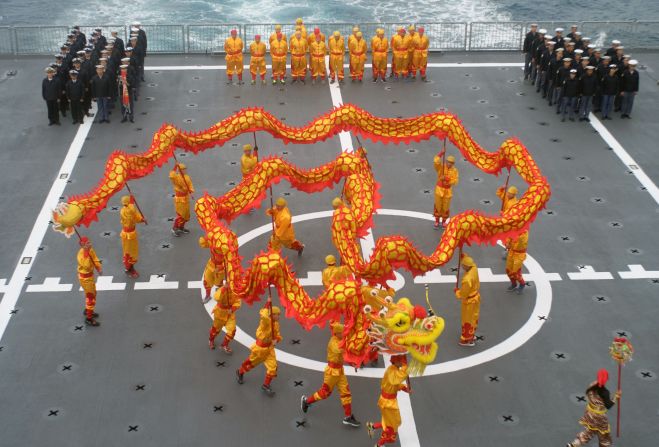 Taiwanese navy sailors watch celebrations marking the Lunar New Year on the deck of a Panshi supply ship after the drill on January 27.