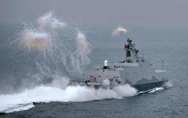 A guided missile corvette launches flares during a drill at sea off Kaohsiung port in southern Taiwan on January 27, 2016.