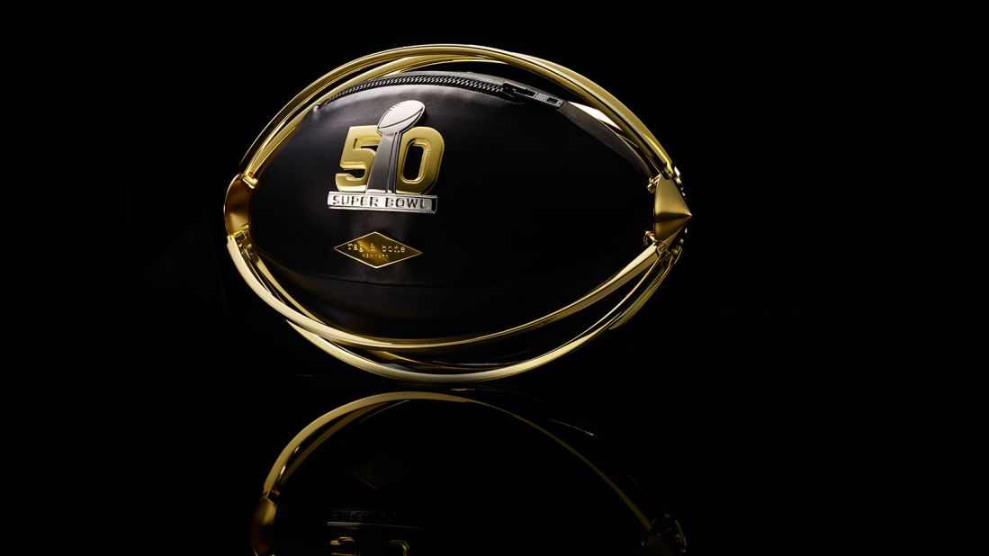 This black leather football is secured inside a gold-plated brass cage. 