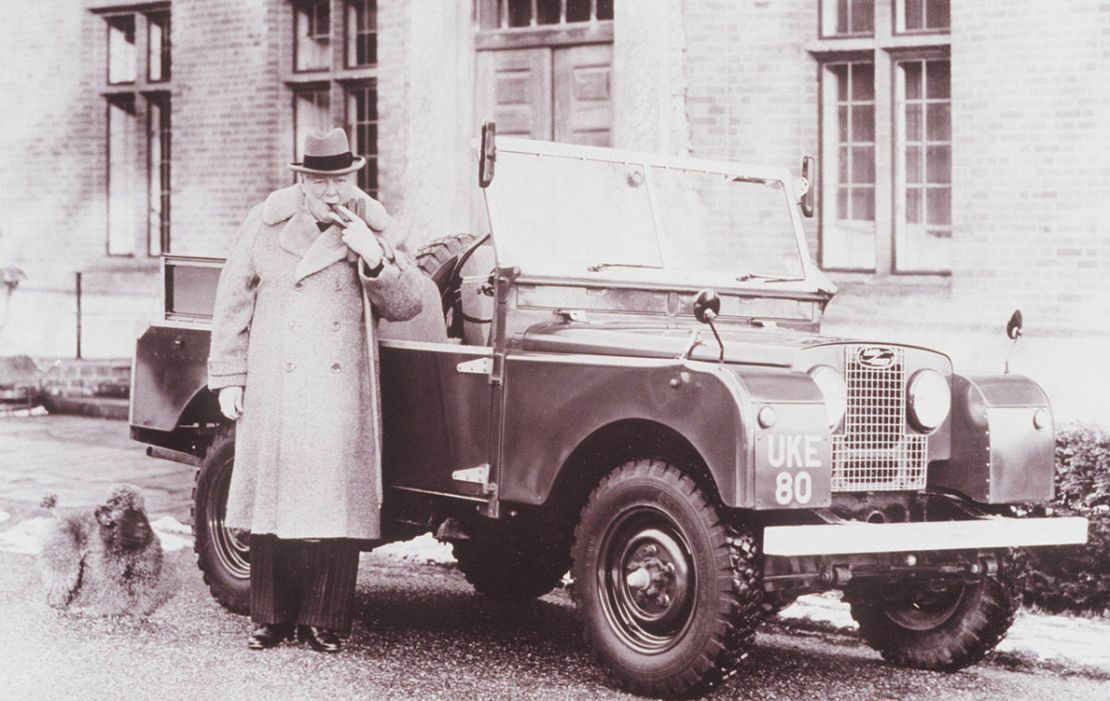 Winston Churchill alongside a Land Rover, one of many high-profile admirers of the off-road vehicle.