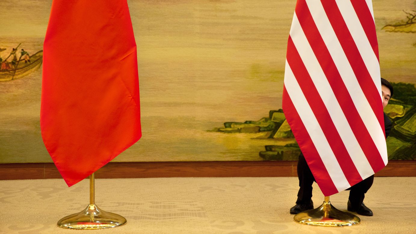 A U.S. flag is tweaked in Beijing ahead of a news conference between U.S. Secretary of State John Kerry and Chinese Foreign Minister Wang Yi on Wednesday, January 27.