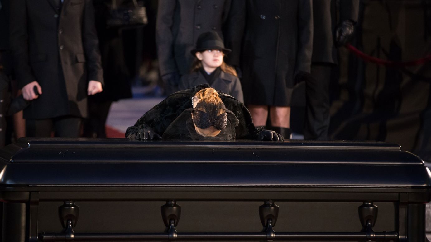 Singer Celine Dion kisses the casket of her husband, René Angélil, after <a href="http://www.cnn.com/2016/01/23/entertainment/ren-anglil-funeral-feat/index.html" target="_blank">his funeral service</a> on Friday, January 22. Angélil died of throat cancer on January 14. He was 73.
