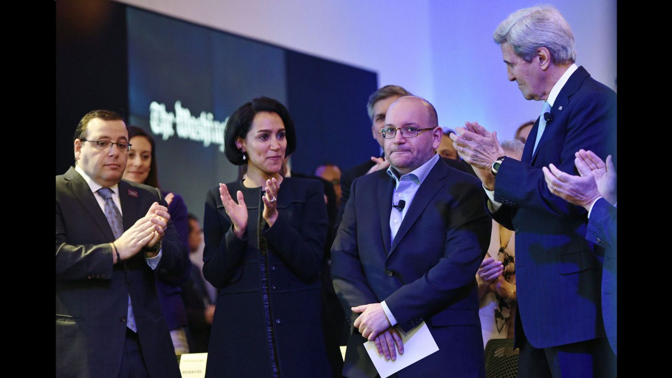 Journalist Jason Rezaian, second from right, is applauded during the inauguration of The Washington Post headquarters on Thursday, January 28. A day earlier, Rezaian <a href="http://money.cnn.com/2016/01/27/media/jason-rezaian-visit-washington-post/" target="_blank">visited the newspaper</a> for the first time since he and three others were freed from an Iranian prison earlier this month.