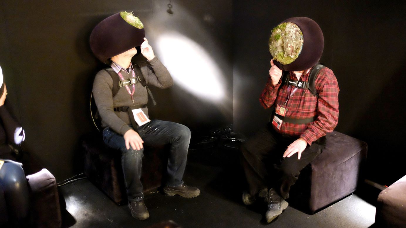 People use virtual-reality headsets during a Sundance Film Festival event held Monday, January 25, in Park City, Utah.