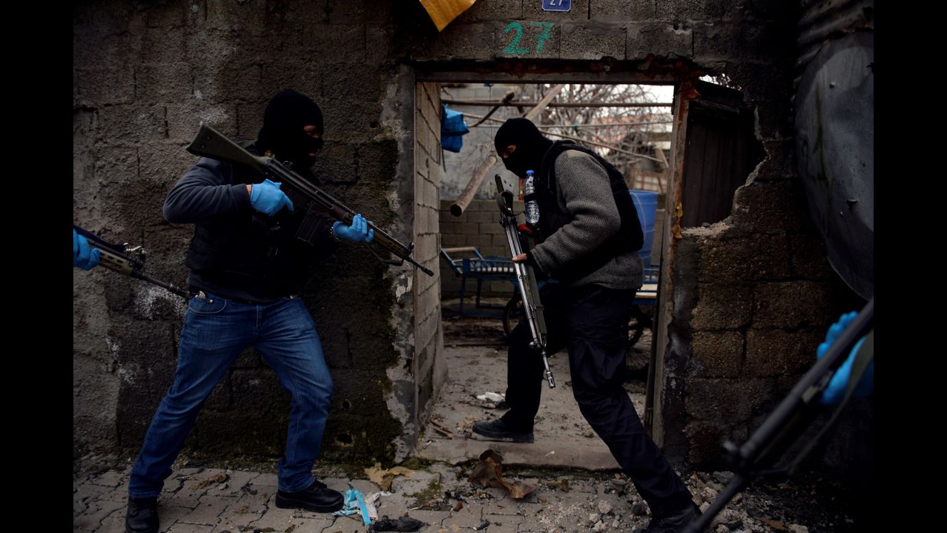 Security forces search a building in Sirnak, Turkey, during a counterterrorism operation on Saturday, January 23.