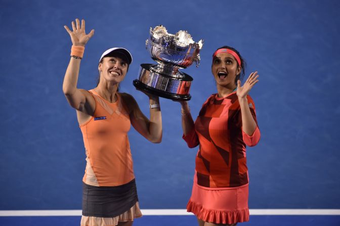 Sania Mirza and Martina Hingis claim the Australian Open title, beating Czech pair Andrea Hlavackova and Lucie Hradecka 7-6 (7-1) 6-3 in the final.