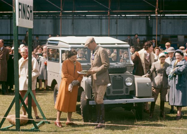 The Queen has also been photographed with the Defender many times. Here she is at the Badminton Horse Trials in 1956. 