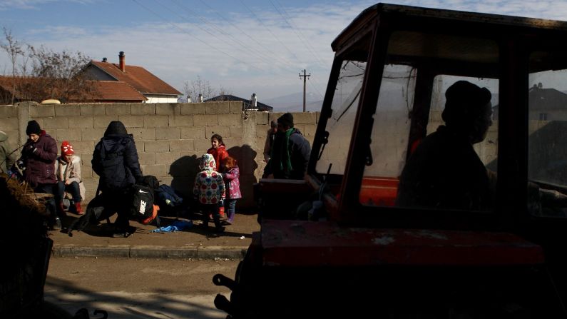 Miratovac's routine was disrupted months ago when refugees began using this route. Today, it is an ordinary sight to see a tractor pass by refugees waiting to board buses.