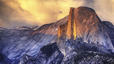 Half Dome rises 4,737 feet above the Merced River on the floor of Yosemite Valley in California. 