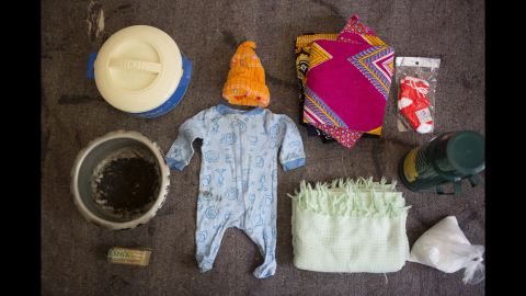 Agnes Noti's bag includes: clothes for the baby, a blanket for the baby, socks, a basin, a flask and tea.