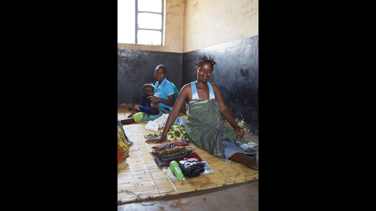 Ellen Phiri, 23, of Malawi, was photographed as she prepared to give birth at the Simulemba Health Centre. It has no clean running water, no sterilization equipment and four toilets for 400 people, according to WaterAid. Water is collected from a water pump shared with the community.