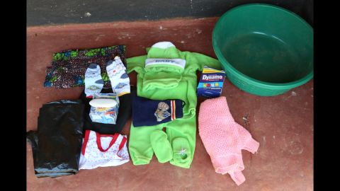 Hazel Shandumba's birth bag includes: baby blanket, cotton wool, a sarong, clothes for the baby, napkins, a basin for water, and a roll of plastic to put on the bed because it is difficult to keep the area clean.