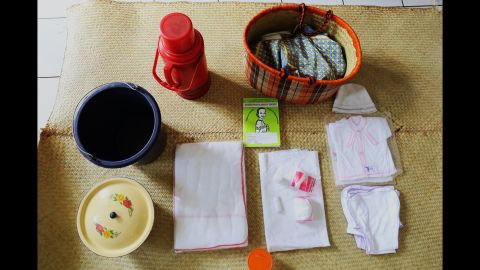 Razafindrabary Claudine's birth basket includes: Clothes for the baby, cotton wool, alcohol for cleaning, diapers, a flask, a bucket and sanitary pads.