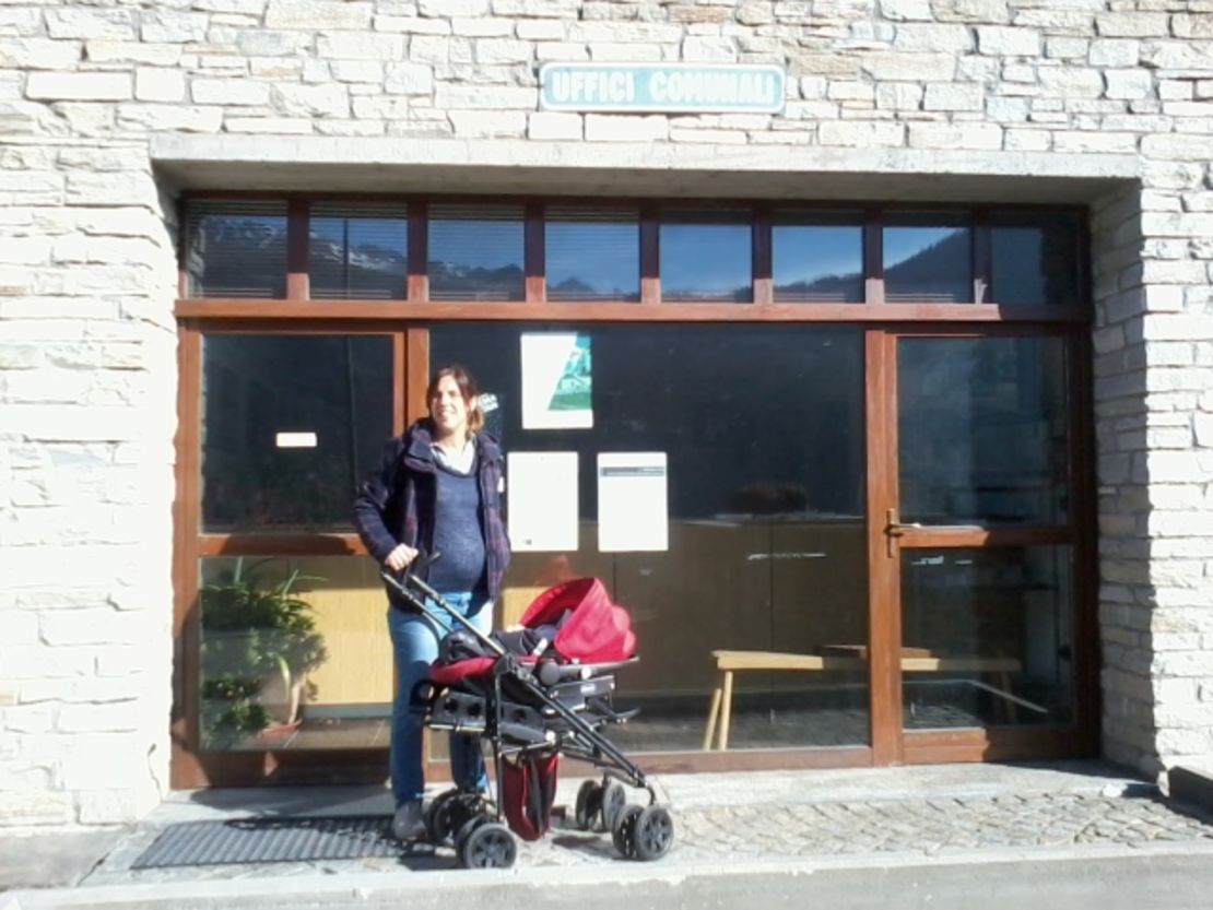 Silvia Rovere about to register her son Pablo at local registry office