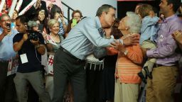 Former Florida Gov. Jeb Bush kisses his mother Barbara Bush as he is introduced to announce his candidacy for the Republican presidential nomination during an event at Miami-Dade College - Kendall Campus on June 15 , 2015 in Miami, Florida.