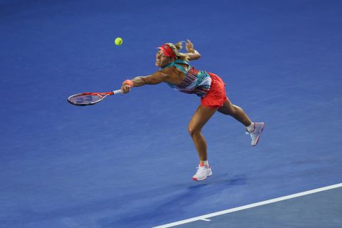 Kerber at full stretch in the thrilling women's singles final against top seed Williams.