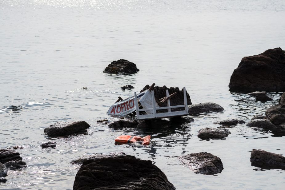 The remains of a boat that was carrying migrants are seen on the shoreline near the Aegean town of Ayvacik, Canakkale, Turkey, Saturday, January 30. At least 33 migrants died after the boat capsized in the Aegean Sea.