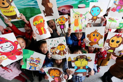 Students display their drawings at a primary school in Donghai County, China, on Thursday, January 14. 