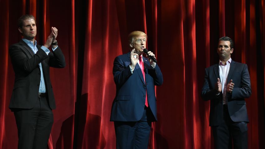 LAS VEGAS, NV - JANUARY 21:  Republican presidential candidate Donald Trump (C) speaks as his sons Eric Trump (L) and Donald Trump Jr. (R) look on during the Outdoor Channel and Sportsman Channel's 16th annual Outdoor Sportsman Awards at The Venetian Las Vegas during the 2016 National Shooting Sports Foundation's Shooting, Hunting, Outdoor Trade (SHOT) Show on January 21, 2016 in Las Vegas, Nevada.  (Photo by Ethan Miller/Getty Images)