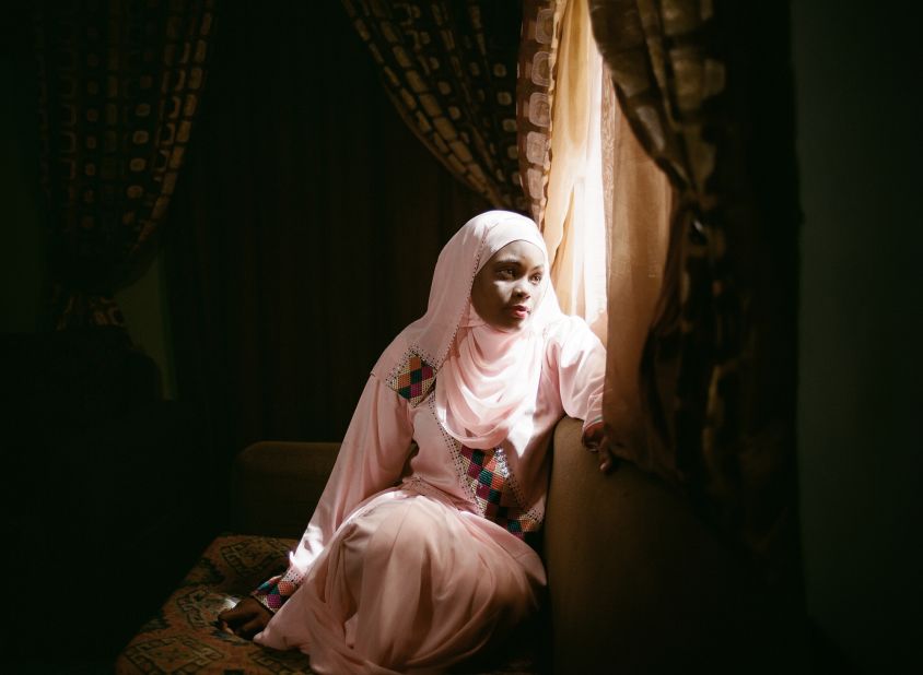 Farida Ado, 27, is one of the authors whose ambitions as a writer sit in conflict with the pressures of Kano's conservative society. Her husband will allow her to work as an author, but only because she can work from home.