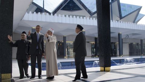 In Malaysia, President Barack Obama (second from left) receives a tour of the National Mosque in Kuala Lumpur on April 27, 2014. Obama paid homage to Malaysia's moderate brand of Islam and visited the mosque during an Asian trip.    