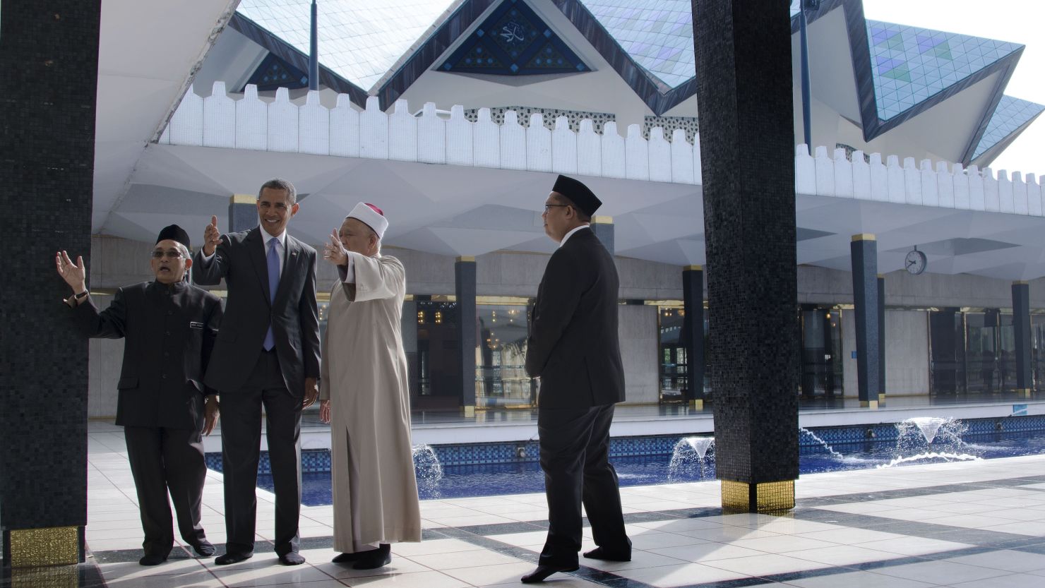 In Malaysia, President Barack Obama (second from left) receives a tour of the National Mosque in Kuala Lumpur on April 27, 2014. Obama paid homage to Malaysia's moderate brand of Islam and visited the mosque during an Asian trip.    