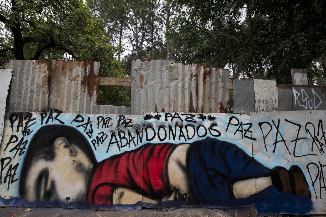 Artists around the world paid tribute to Kurdi in September 2015. This mural, appeared in Brazil.