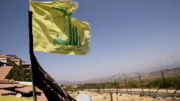 A Hezbollah flag in Lebanon, near a fence on the Israeli-Lebanese border 10 years ago.