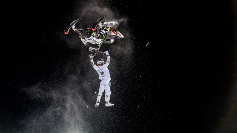 Heath Frisby performs a trick on his snowmobile during the Winter X Games on Friday, January 29. He won silver in the freestyle event, which took place in Aspen, Colorado.
