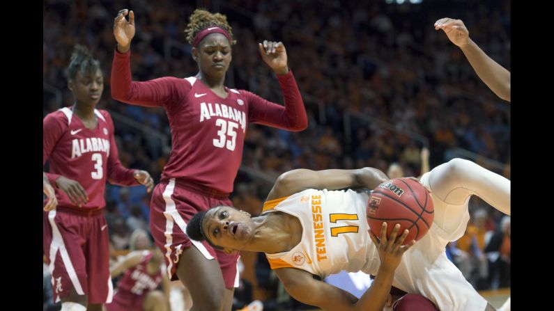 Tennessee's Diamond DeShields goes horizontal after colliding with an Alabama player (off camera) in Knoxville, Tennessee, on Sunday, January 31.