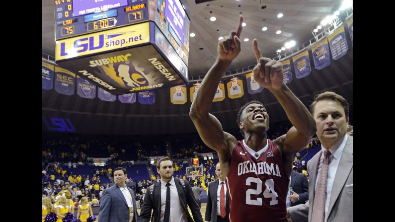 Oklahoma guard Buddy Hield celebrates after his team defeated LSU in Baton Rouge, Louisiana, on Saturday, January 30. The top-ranked Sooners won 77-75.