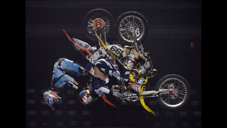 Petr Pilat, left, and Travis Pastrana practice Sunday, January 31, before the Nitro Circus Live event in Prague, Czech Republic.