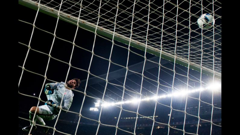 Iago Herrerin, the goalkeeper for Athletic Bilbao, clears the ball over the bar during a Copa del Rey match against FC Barcelona on Wednesday, January 27. Barcelona won the match 3-1 to clinch a spot in the semifinals of the Spanish tournament.