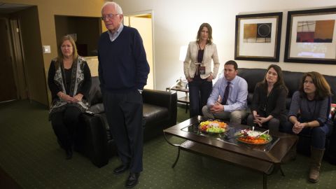 Sanders watches caucus returns at his hotel room in Des Moines.