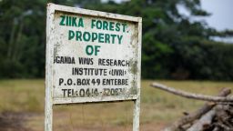 A well-worn sign is the only indication of the start of the Zika forest, Uganda's only preserve devoted entirely to science research.