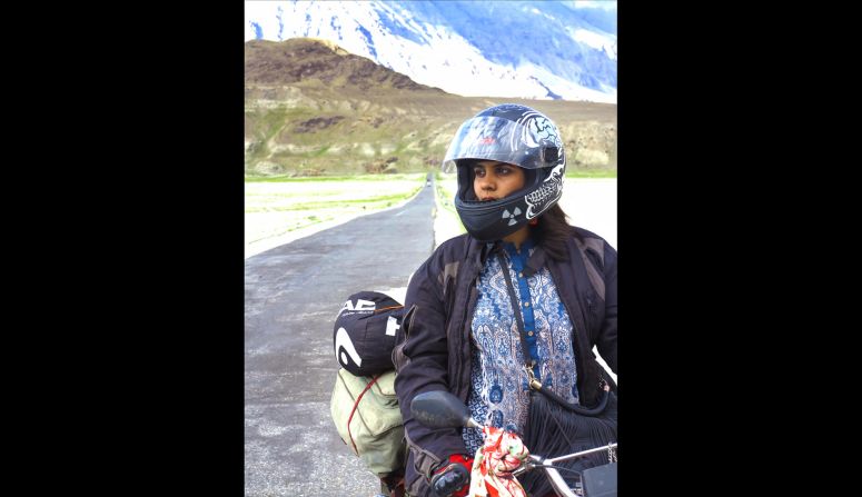 She wears a helmet, boots and bulky jacket that give little away of her feminine form. "They obviously thought I was male," she explains. "Whenever I stopped to ask directions and they realized I was female, they didn't know what to do."