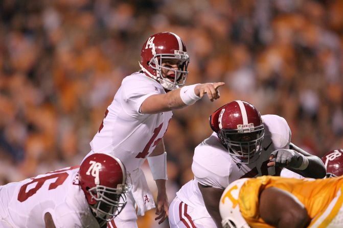 Former Alabama Crimson Tide quarterback John Parker Wilson (#14) says mental strength conditioning allowed him to focus in even the most hostile environments. He is seen pointing out the defensive alignment of the Tennessee Volunteers during an away game on October 25, 2008, when Alabama defeated Tennessee 29-9.