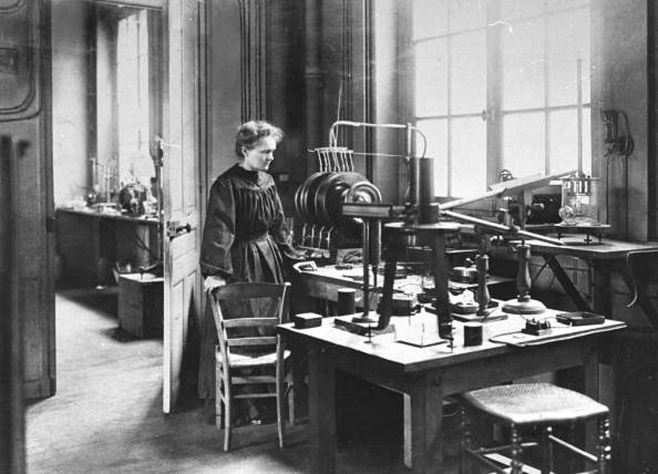 Marie Curie (1867-1934) in her laboratory. The great Polish-French chemist discovered both radioactivity and the radioactive elements radium and polonium, achievements that won her two Nobel prizes. She was the first woman to win the award, the first person and only woman to win it twice, and the only person to win it in two different sciences, physics and chemistry. The Curie household has received four Nobels in total, as Marie's husband Pierre shared one with her and their daughter Irène won one on her own. 