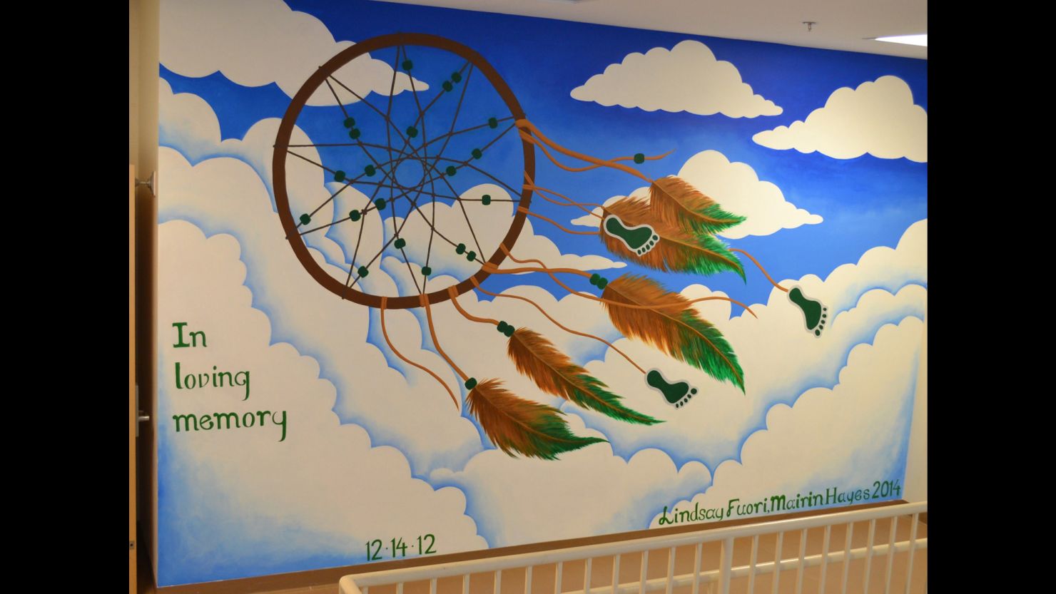 A mural painted in honor of the victims of the Sandy Hook massacre was covered over.