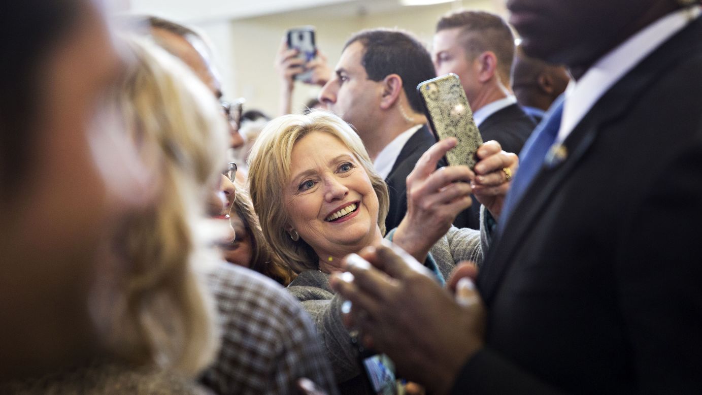 Democratic presidential candidate Hillary Clinton takes a selfie during a campaign event in Council Bluffs, Iowa, on Sunday, January 31.
