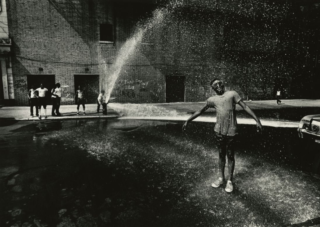 On a hot summer day in 1961, Louis Draper took his camera outside to snap this gleeful moment of kids playing in the shooting spray of a New York City fire hydrant. Although Draper died in 2002 and was not widely famous during his lifetime, his photography -- mostly of everyday African-Americans -- has gained him a newfound appreciation in recent years. The <a href="http://www.stevenkasher.com/exhibitions/louis-draper" target="_blank" target="_blank">Steven Kasher Gallery </a>in New York is exhibiting more than 75 of his photos through February 20.