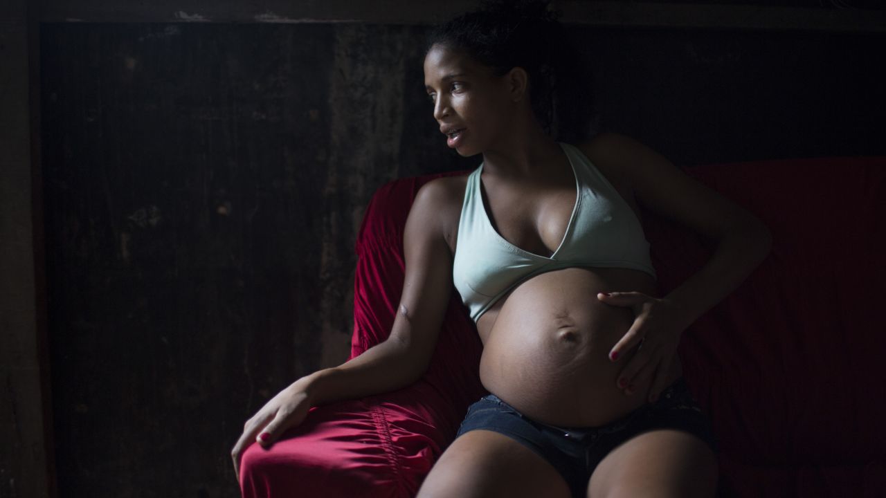 Tainara Lourenco sits inside her home in Recife, Brazil, on Friday, January 29.  Lourenco, five months pregnant, lives at the epicenter of Brazil's Zika outbreak. The Zika virus has been linked to microcephaly, a neurological disorder that results in newborns with small heads and abnormal brain development.