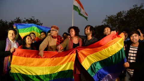 Indian gay rights activists celebrate after the country's Supreme Court agreed to review a decision which criminalises gay sex in New Delhi on February 2, 2016.