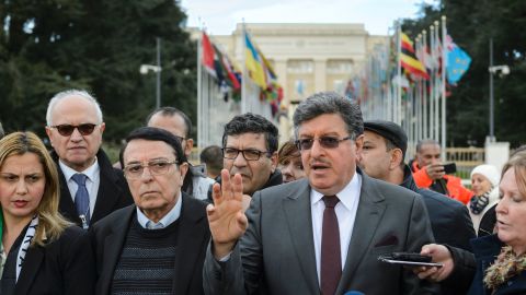 Members of the main Syrian opposition delegation speak outside United Nations offices in Geneva on Tuesday.