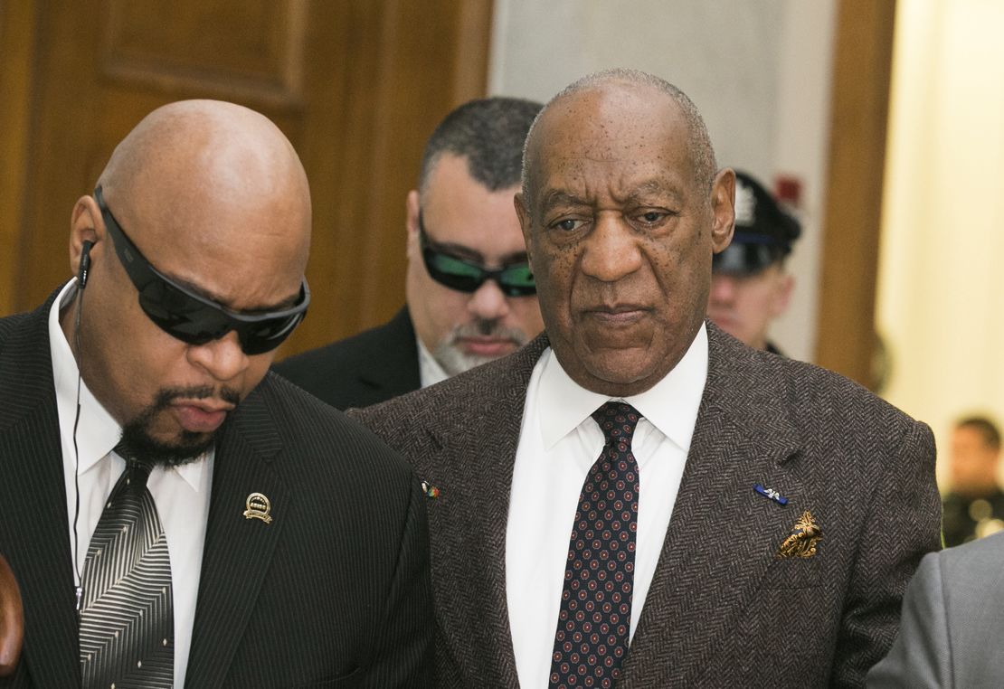 Bill Cosby, who his lawyers now say is legally blind, has been escorted into his recent court hearings on the arms of his representatives.