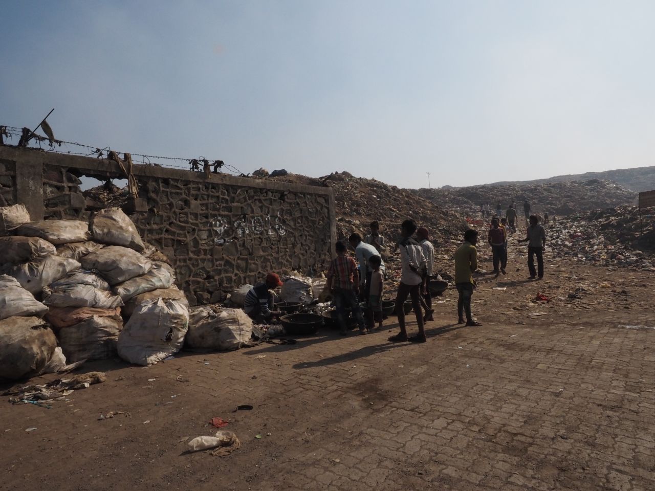 The dump is surrounded on three sides by slums -- which critics say is the reason the government won't make any effort to provide basic services.